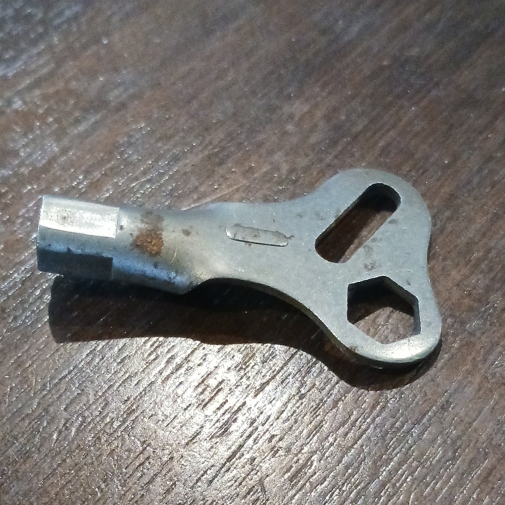 Vintage Roller Skate Metal Key